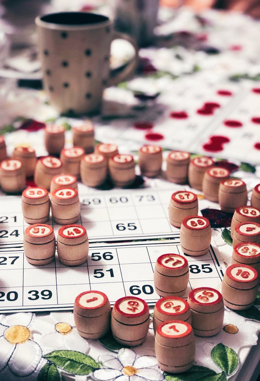 bingo chips on top of bingo cards